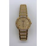 PIAGET; a gentleman's 18ct gold and diamond set wristwatch with brick link bracelet set with 600