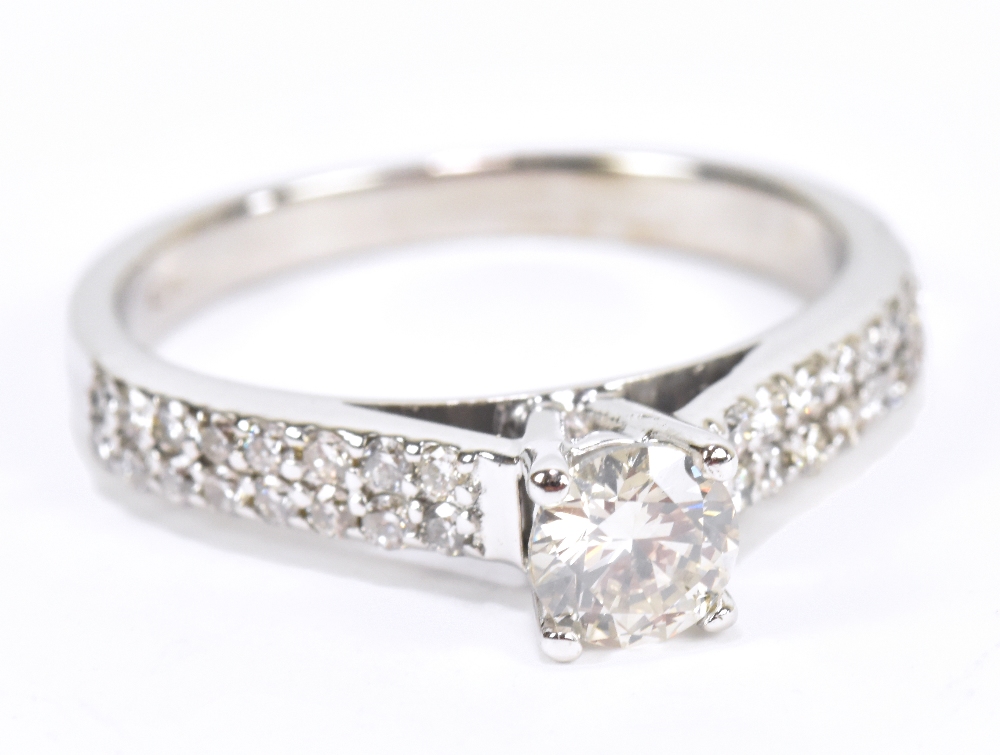 An 18ct white gold diamond solitaire ring, the principal stone weighing approx 0.50cts with