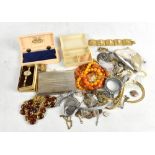 A quantity of costume jewellery including bead necklaces, chains, bracelets, brooches, watch box,
