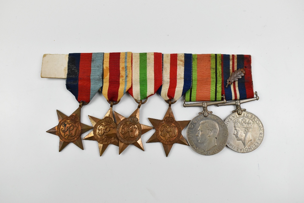 A WWII medal group of six comprising War Medal with oak leaf, Defence Medal, France and Germany,