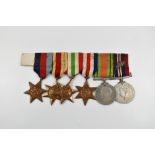 A WWII medal group of six comprising War Medal with oak leaf, Defence Medal, France and Germany,