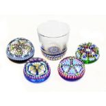 PERTHSHIRE; four glass paperweights, each with Millefiori decoration to include example signed and