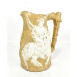 A 19th century stoneware jug, probably Staffordshire, featuring King Charles (probably) on