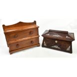 A Victorian rosewood and mother of pearl inlaid tea caddy of sarcophagus form, with two internal