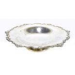 ADIE BROS LTD; a George V hallmarked silver comport with cast foliate and shell shaped rim on