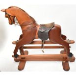 HORSEPLAY; a modern mahogany rocking horse, height 118cm.