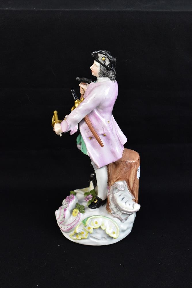 MEISSEN; a mid-18th century figure of a sword maker, painted marks to back of base, height 23cm. - Image 2 of 7