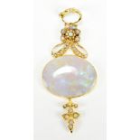 An 18ct yellow gold opal set pendant, length of drop 5.75cm, approx 6.4g (af).Additional