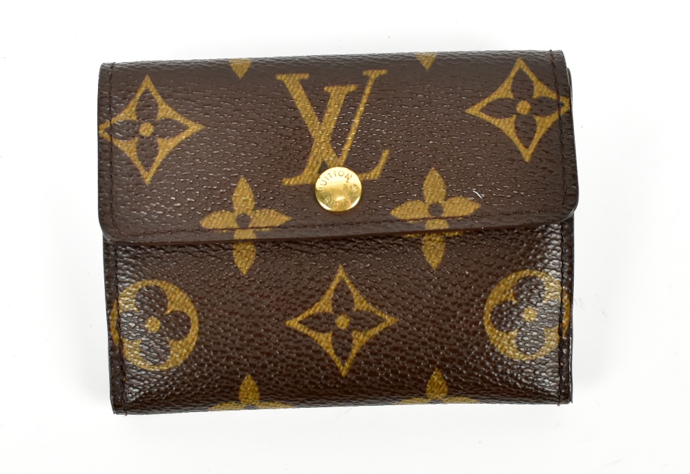 LOUIS VUITTON; a Monogram canvas money wallet, and gold money clip.