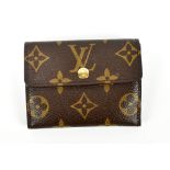 LOUIS VUITTON; a Monogram canvas money wallet, and gold money clip.