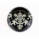 WHITEFRIARS; a limited edition faceted glass paperweight, 'Snow Crystal', dated 1981, diameter 7cm.