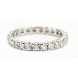 An 18ct white gold and diamond full eternity ring, diamond weight approx 0.62cts, size O 1/2, approx