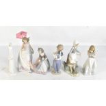 LLADRO; a collection of six figurines, to include 'Afternoon Promenade', 'Bridal Belle', etc, each