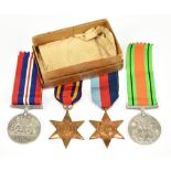 A WWII medal group of four comprising War and Defence Medals, 1939-1945 and Burma Stars.