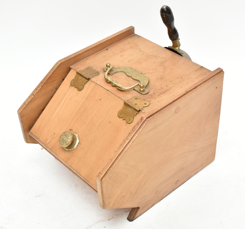 An Irish wooden coal scuttle with brass shovel.