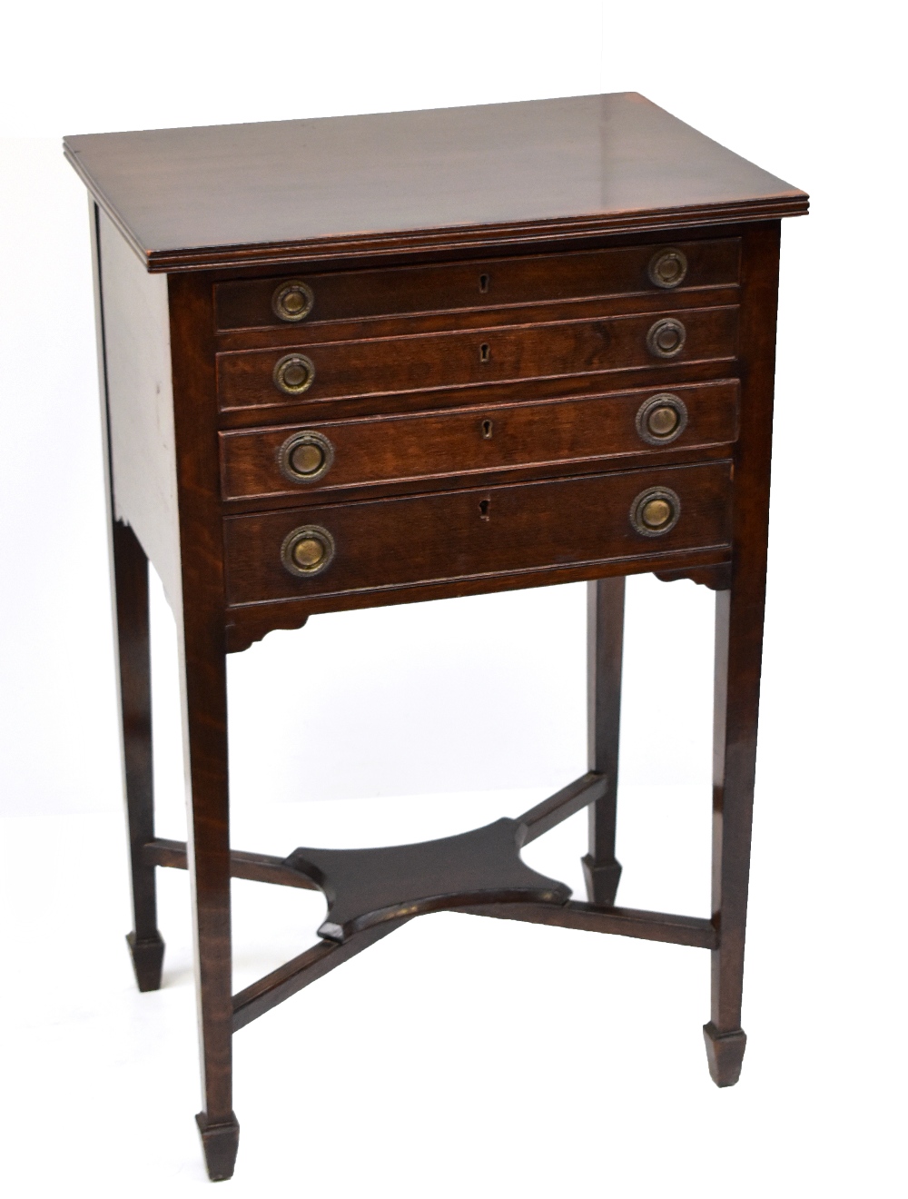 An Edwardian oak four drawer cutlery cabinet, with stretchered under tier.