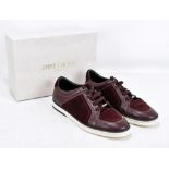 JIMMY CHOO, MIAMI; a pair of burgundy suede and patent leather men's trainers, with a think sole,