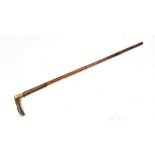 A 9.1mm x 40 Malacca shafted centre fire walking stick gun with horn handle, overall length 84cm.
