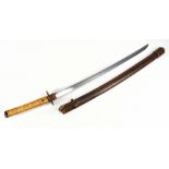 A Japanese katana for restoration, blade length approx 69cm, with relief decorated tsuba to over