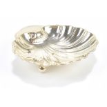 HARRISON BROS & HOWSON; a George V hallmarked silver scallop moulded dish on three ball feet,