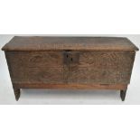 A 19th century carved oak plank coffer (af).