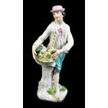 MEISSEN; a mid-18th century figure of a vegetable seller from the 'Cris de Paris' series circa