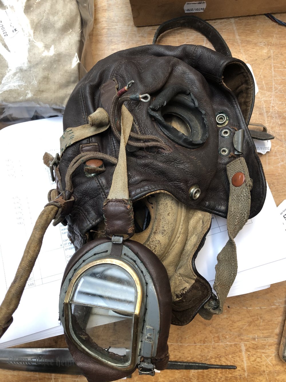 A group of military equipment and accessories including four leather flying helmets/caps, an RAF - Image 13 of 16
