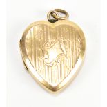 A 15ct yellow gold heart shaped pendant, approx 3.1g.Additional InformationIt is slightly sprung,