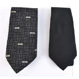 MOSCHINO; a black patterned silk tie with Moschino logo and a Christian Dior black and red lined