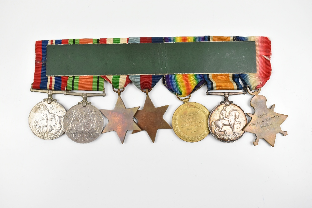 A WWI and WWII medal group of seven, the WWI trio awarded to 10525 Pte. W.J. Roberts Cheshire - Image 2 of 5