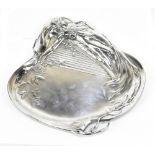 WMF; an Art Nouveau electroplated tray of shaped outline, featuring lady and harp in relief, stamped