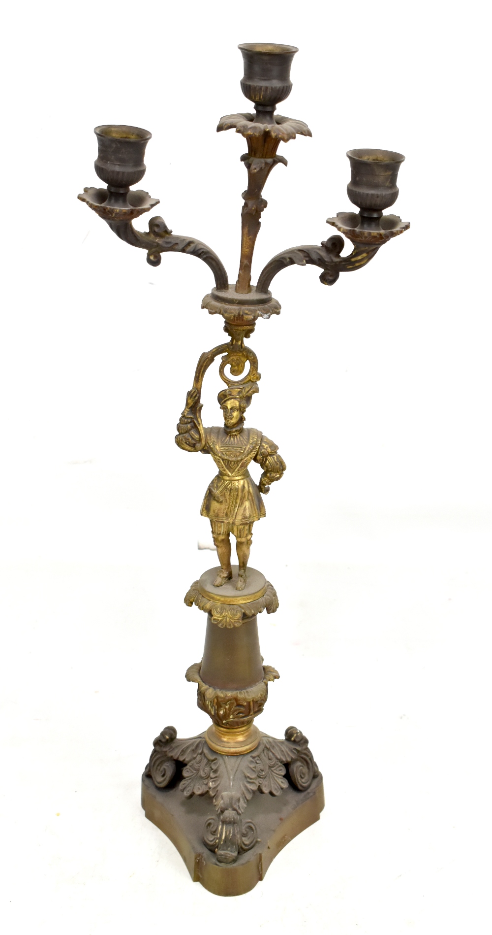 A 19th century brass and mixed metal figural candelabrum with three sconces and tripartite base,