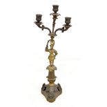 A 19th century brass and mixed metal figural candelabrum with three sconces and tripartite base,