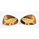 TIFFANY & CO; an unusual and rare pair of 14ct yellow gold 'Husky-Musky' cuff links, each fish set