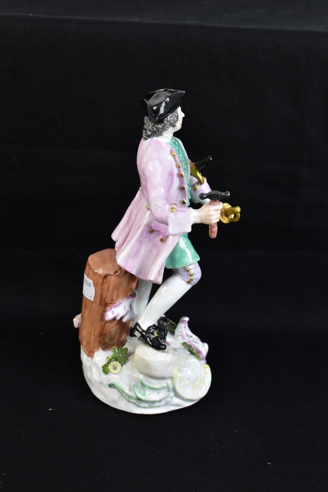 MEISSEN; a mid-18th century figure of a sword maker, painted marks to back of base, height 23cm. - Image 4 of 7