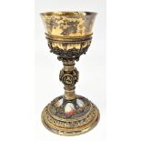 KRONENBITTER OF MUNICH; a late 19th century silver gilt and enamel decorated chalice of Gothic