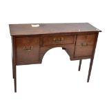 A George III mahogany knee holed sideboard, with small central drawer flanked by two deep drawers,