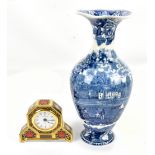 ROYAL CROWN DERBY; an 'Old Imari' pattern table clock, the circular dial set with Roman numerals,