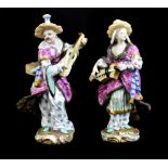 MEISSEN; a pair of mid/late 19th century Malabar figures, painted marks to base, incised 1569 and
