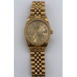 ROLEX; a gentleman's 18ct gold Datejust wristwatch with diamond hour markers and original bracelet