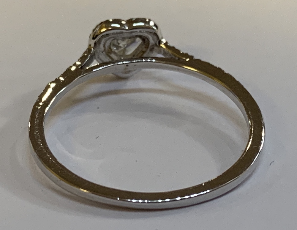 An 18ct white gold diamond ring with heart shaped principal stone within a border of diamonds, - Image 5 of 5