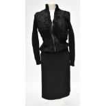 CHANEL; a black wool skirt, length 62cm, with logo zips, size medium, and a Verger faux fur and wool