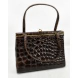 A vintage brown crocodile leather skin handbag with gold hardware, 26 x 20 x 7cm.