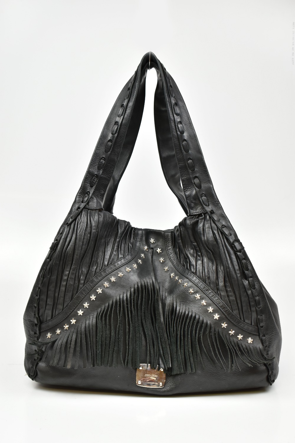 JIMMY CHOO IMAN; a black Napa leather star studded fringe shoulder bag with silver-tone hardware, 38
