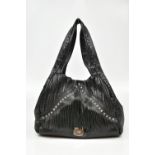 JIMMY CHOO IMAN; a black Napa leather star studded fringe shoulder bag with silver-tone hardware, 38