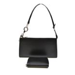 LOUIS VUITTON; a black epi leather evening shoulder bag with silver coloured hardware and zip top,