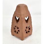 An Allach SS Jullevchter terracotta candle holder with pierced heart and wheel detail, impressed