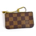 LOUIS VUITTON; a Monogram Pochette Clefs keyring/coin purse, with gold-tone hardware, 12 x 6cm.