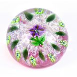 PAUL Y'SART; a H cane floral paperweight, signed to base, diameter 6cm.Additional InformationMinor