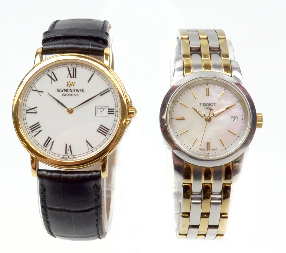 TISSOT; a lady's two tone stainless steel bracelet watch, the mother of pearl effect dial set with